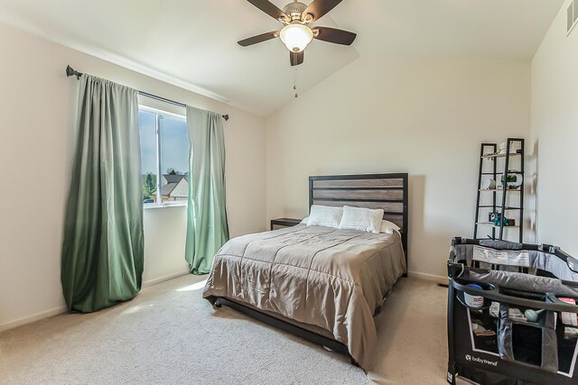 carpeted bedroom featuring baseboards, a ceiling fan, lofted ceiling, and visible vents