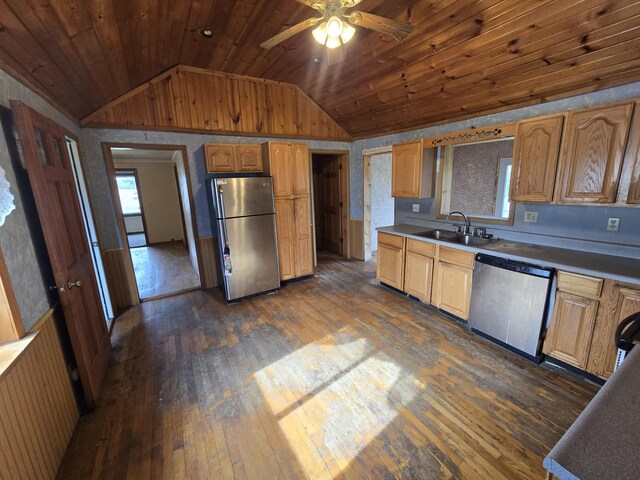 4391 Tamarack Rd, Hillsdale, MI 49242 - kitchen featuring a sink, lofted ceiling, freestanding refrigerator, dishwashing machine, and wood ceiling