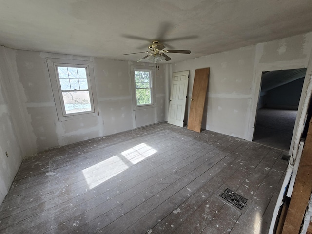 4391 Tamarack Rd, Hillsdale, MI 49242 - spare room with hardwood / wood-style flooring and a ceiling fan