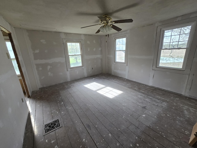 4391 Tamarack Rd, Hillsdale, MI 49242 - unfurnished room with hardwood / wood-style floors and ceiling fan