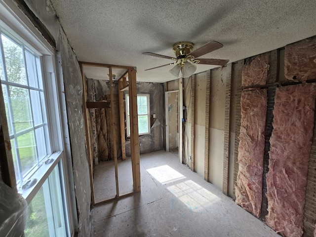 4391 Tamarack Rd, Hillsdale, MI 49242 - misc room featuring ceiling fan and a textured ceiling
