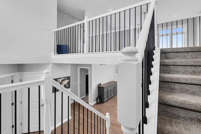146 Bloomfield Blvd, Brooklyn, MI 49230 - staircase with visible vents and wood finished floors