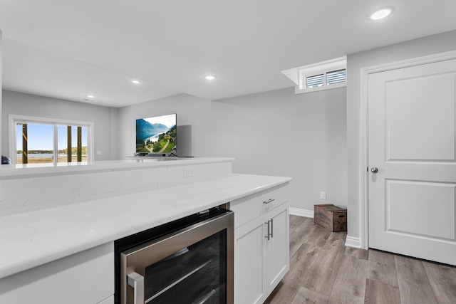 146 Bloomfield Blvd, Brooklyn, MI 49230 - bar with recessed lighting, light wood-style flooring, wine cooler, and baseboards