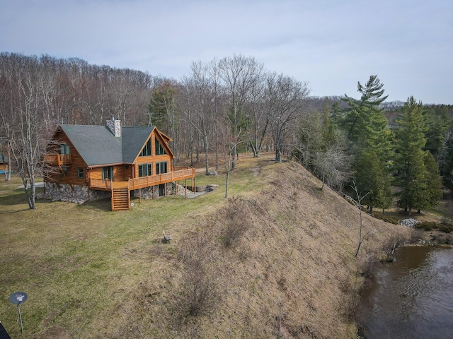 aerial view featuring a forest view