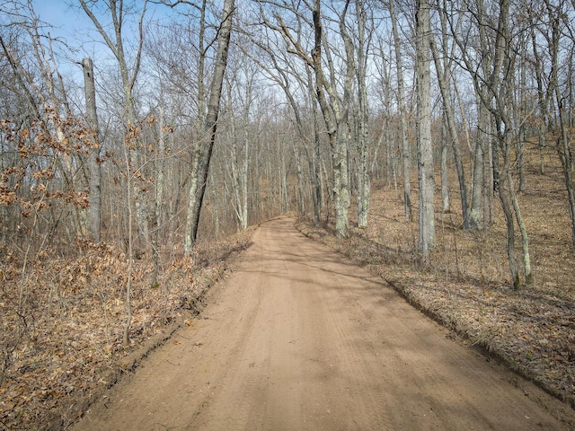 view of road featuring a view of trees