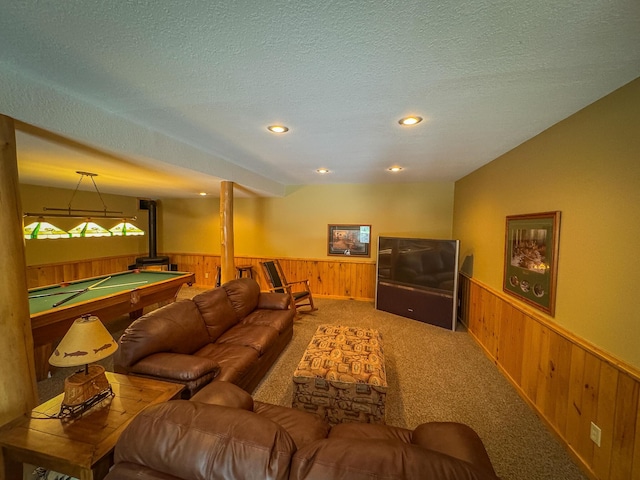 carpeted living area with recessed lighting, wood walls, wainscoting, and pool table