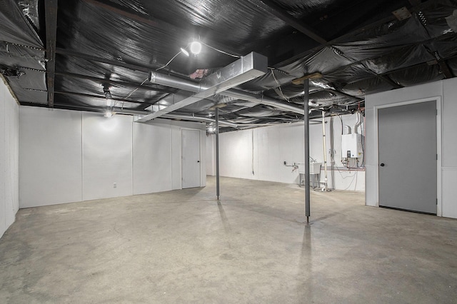 unfinished basement with water heater