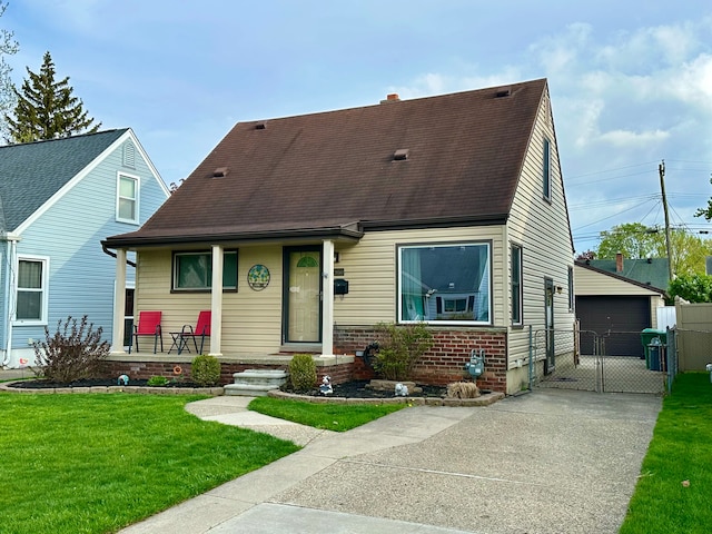 new england style home featuring covered porch, a gate, a garage, a front lawn, and a shingled roof