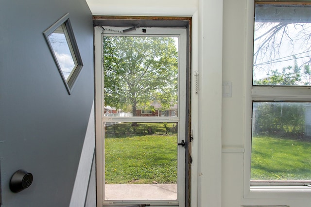 doorway to outside with a healthy amount of sunlight