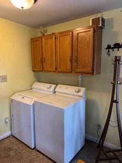 10100 Woodlawn Rd, Saint Helen, MI 48656 - washroom with baseboards, independent washer and dryer, and cabinet space