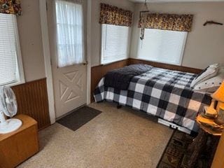 10100 Woodlawn Rd, Saint Helen, MI 48656 - bedroom featuring carpet floors and multiple windows