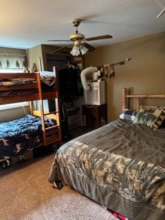 10100 Woodlawn Rd, Saint Helen, MI 48656 - carpeted bedroom with ceiling fan