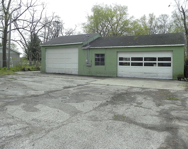 garage featuring fence