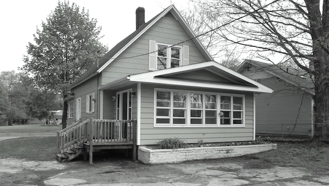 view of front of property with a chimney
