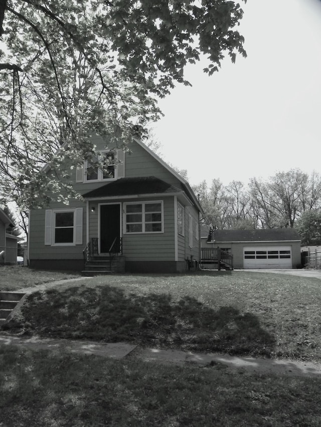 bungalow-style home featuring a garage, entry steps, and dirt driveway