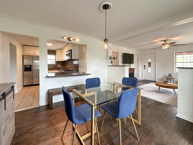524 E Farnum Ave, Royal Oak, MI 48067 - dining room featuring baseboards, ornamental molding, and dark wood-type flooring