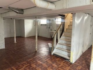 basement featuring stairway