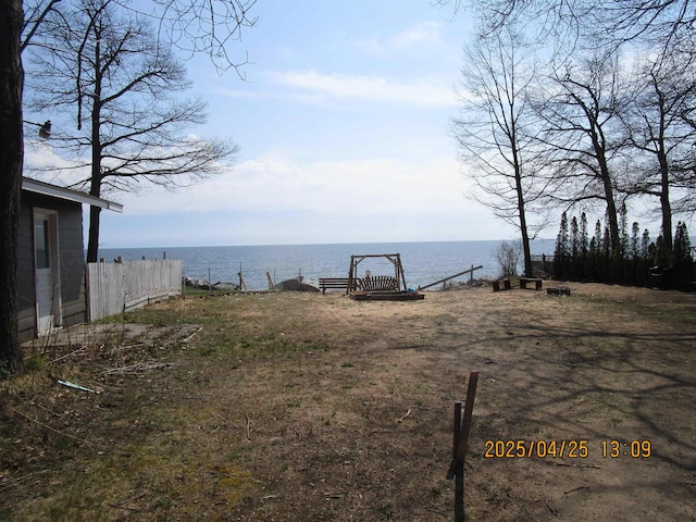 975 N Huron, East Tawas, MI 48730 - view of yard with a water view