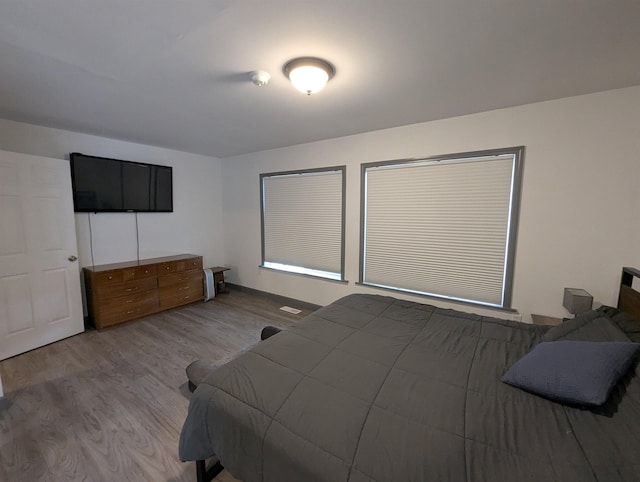 3344 E Huron, Au Gres, MI 48703 - bedroom featuring wood finished floors
