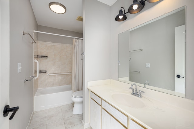 568 Foxboro Sq Unit 59, Brighton, MI 48116 - bathroom with visible vents, tile patterned floors, vanity, toilet, and shower / tub combo with curtain