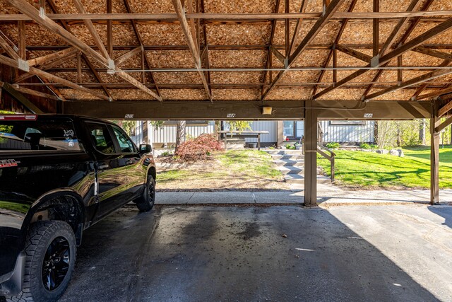 568 Foxboro Sq Unit 59, Brighton, MI 48116 - view of covered parking lot