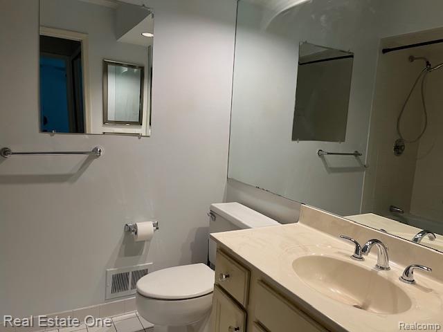 1797 Golf Ridge Dr, Bloomfield Hills, MI 48302 - bathroom with tile patterned flooring, vanity, and a shower
