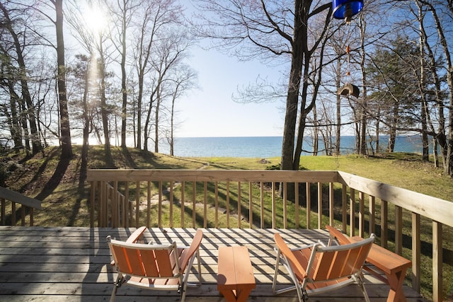 wooden deck with a water view