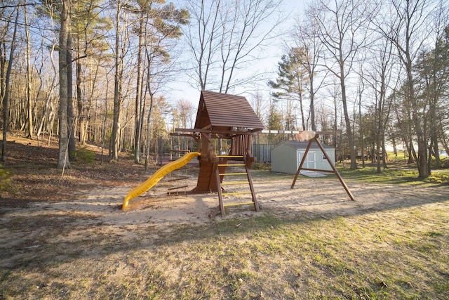 view of play area featuring a storage shed and an outdoor structure