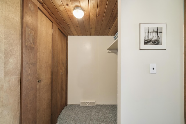 interior space with visible vents and carpet flooring