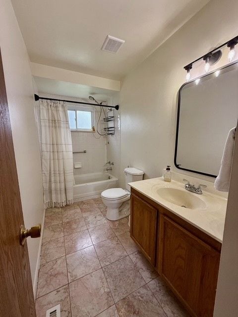 bathroom featuring vanity, shower / tub combo, visible vents, and toilet