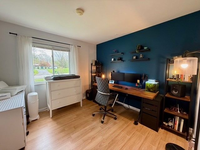 home office featuring wood finished floors