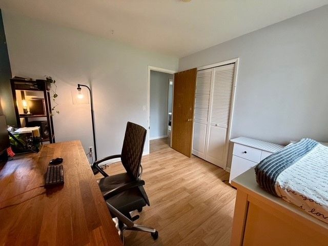 home office with light wood-type flooring