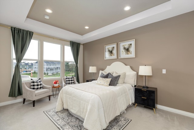 2774 Polson St, Ann Arbor, MI 48105 - bedroom with baseboards, recessed lighting, a tray ceiling, and light carpet