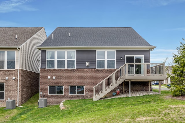 2774 Polson St, Ann Arbor, MI 48105 - rear view of property featuring a lawn, stairway, central AC unit, and a wooden deck