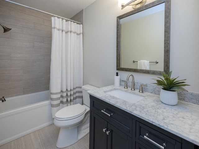 full bathroom featuring vanity, shower / bathtub combination with curtain, and toilet