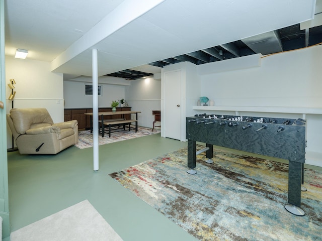 game room featuring visible vents and finished concrete flooring