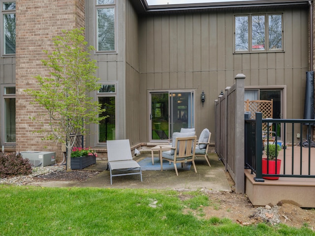 back of house featuring a patio and central AC