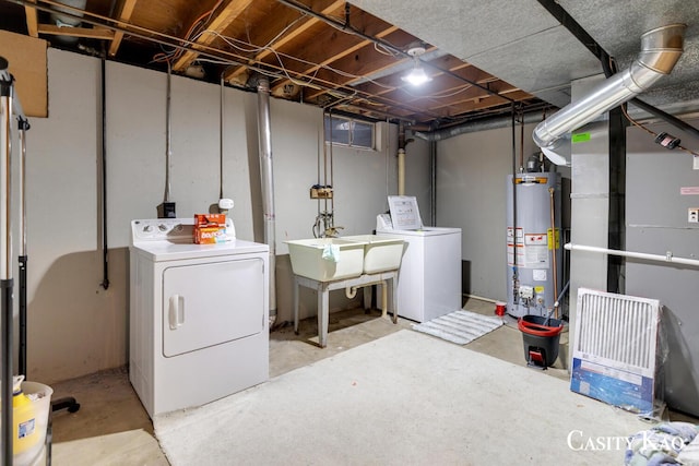 7116 Linden Ave SE, Grand Rapids, MI 49548 - unfinished below grade area with washing machine and clothes dryer and water heater