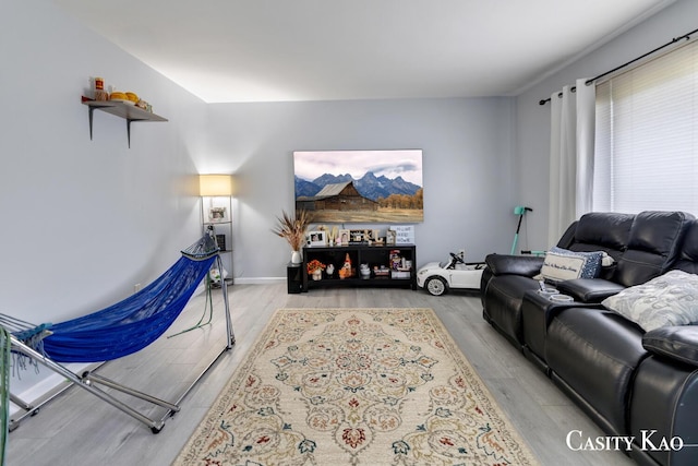 7116 Linden Ave SE, Grand Rapids, MI 49548 - living room featuring wood finished floors
