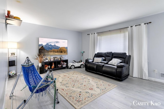 7116 Linden Ave SE, Grand Rapids, MI 49548 - living area with visible vents and wood finished floors