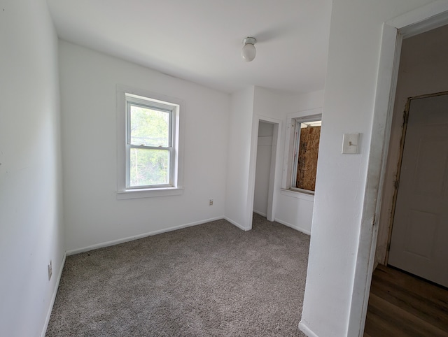 249 W Wilson Ave, Pontiac, MI 48341 - unfurnished bedroom with carpet flooring and baseboards