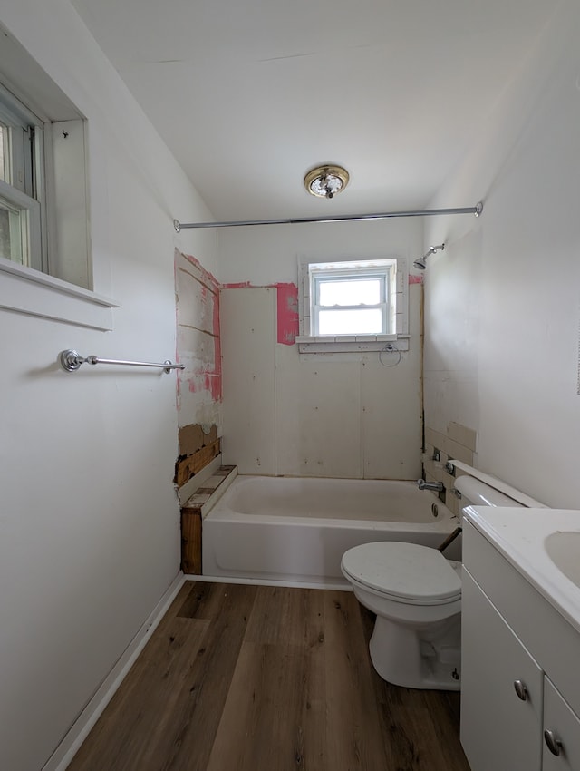 249 W Wilson Ave, Pontiac, MI 48341 - full bathroom with bathing tub / shower combination, vanity, toilet, and wood finished floors