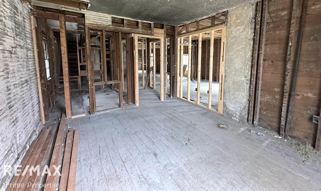 miscellaneous room featuring wood-type flooring