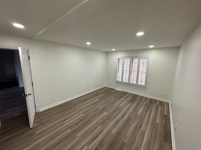 9615 Woodland Ct, Ypsilanti, MI 48197 - below grade area featuring recessed lighting, baseboards, and dark wood-type flooring