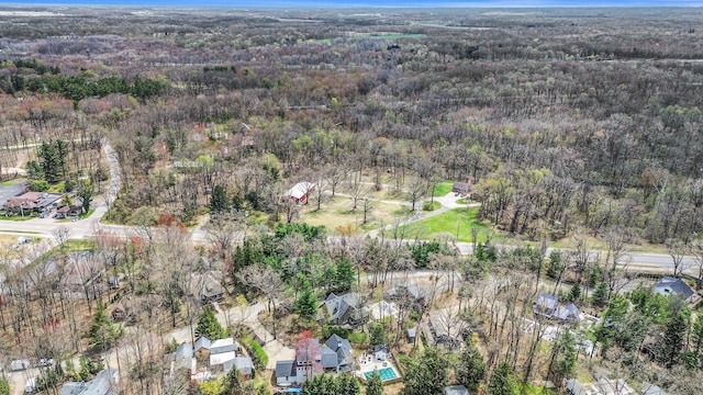 aerial view featuring a residential view and a forest view