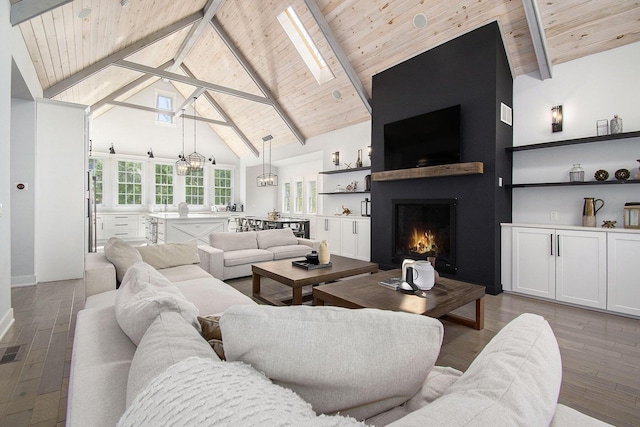 living room with beam ceiling, a fireplace, high vaulted ceiling, wooden ceiling, and wood finished floors