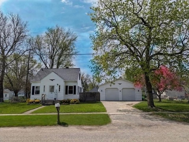 2326 Southampton Ave, Grand Blanc, MI 48507 - view of front facade featuring a front lawn, an outbuilding, and a garage