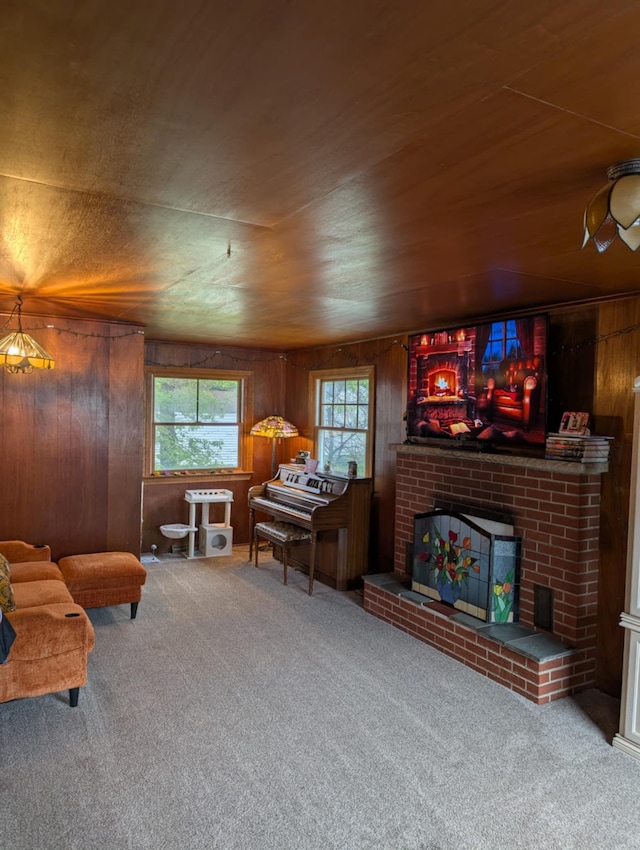 2326 Southampton Ave, Grand Blanc, MI 48507 - sitting room featuring a healthy amount of sunlight, wood walls, a brick fireplace, and carpet floors