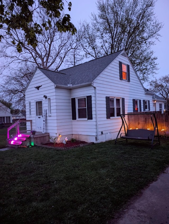2326 Southampton Ave, Grand Blanc, MI 48507 - bungalow featuring a shingled roof and a front yard
