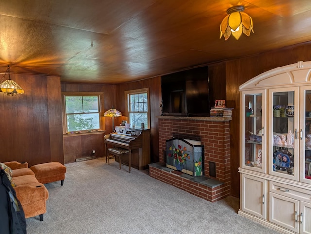 2326 Southampton Ave, Grand Blanc, MI 48507 - sitting room featuring wooden ceiling, a brick fireplace, wood walls, and carpet flooring